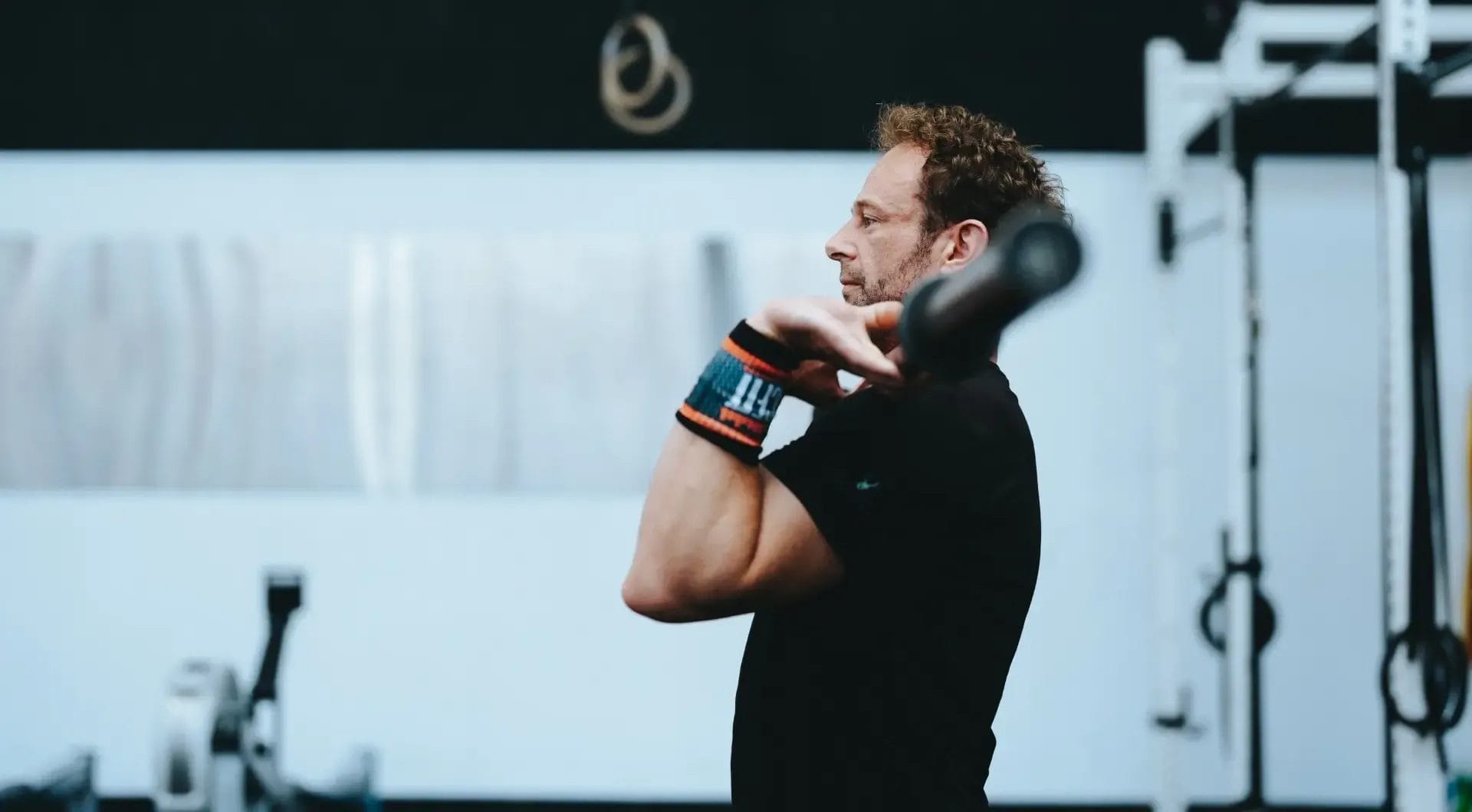 man taking a lifting class